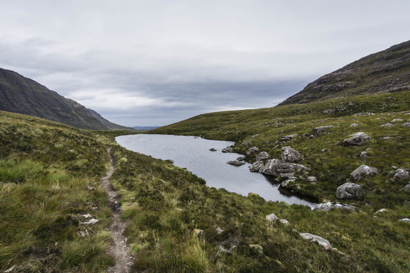 There is a small lochan in the Coire Roill Pass