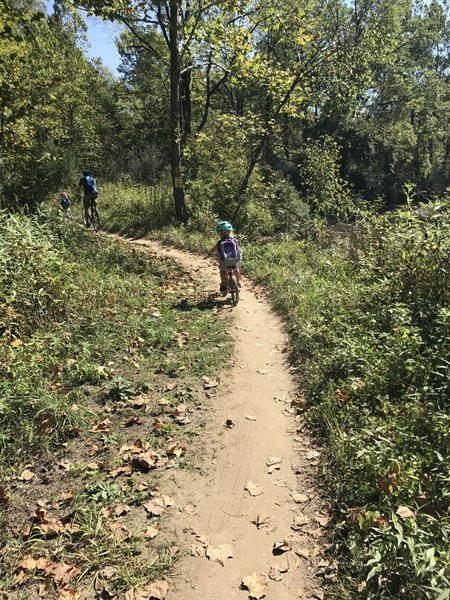 Track along the river.