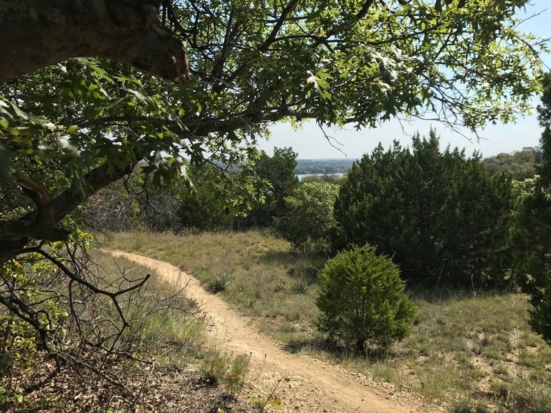 Quanah Hill 1886 Trail view from bench in quiet secluded picnic area.