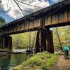 rustic railroad, river, rider