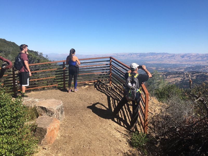 You'll find a mix of trail users enjoying the view from the Guadalupe Creek Overlook. Located on the Mount Umunhum Trail, 1.3 miles from the trailhead