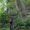 A racer climbing out of Hell Creek during the RRG MTB 100.