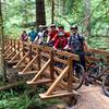 NW Trail Alliance ride group posing on the newly completed "Link'n'Pin" bridge on Shoofly over Genzer Creek