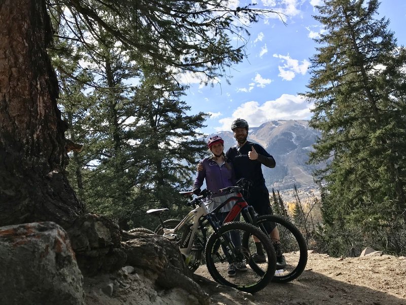 Riding “the corner” next to the rushing river with a great and very steep overlook!