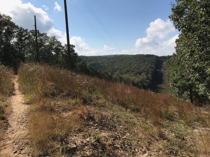 The power line crossing — the top of the hill in the distance is Highway 157.