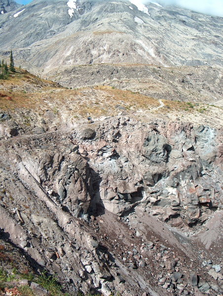 Climbing the cliff above Ape Canyon. Note the tiny rider who is actually full sized.