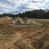 This is after we finished compact around these machine place boulders.  The expert line is center with intermediate, beginner, and crusher stone lines surrounding.  There's plenty of options.