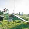 Jumping the wooden 'whale-tail' feature on the XL Slopestyle Line.