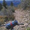 Steep descent on coarse gravel.