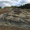 Looking uphill at the 7th rock feature with 3 additional rock features in the background.  Middle Run lacked technical rock gardens so the Trail Spinners manufactured them.  Over 200 tons of Avondale Brown Boulders used.