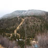 Snow on the higher peaks, October 31, 2017.  The Berminator downhill trail can be seen traversing across the forest towards Long Horn.