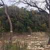 Rope swings above a very dry Barton Creek