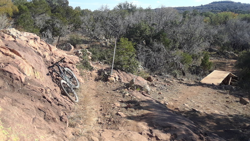 Texas Enduro Cup's JAWS drops off to the right and the Race Loop continues straight