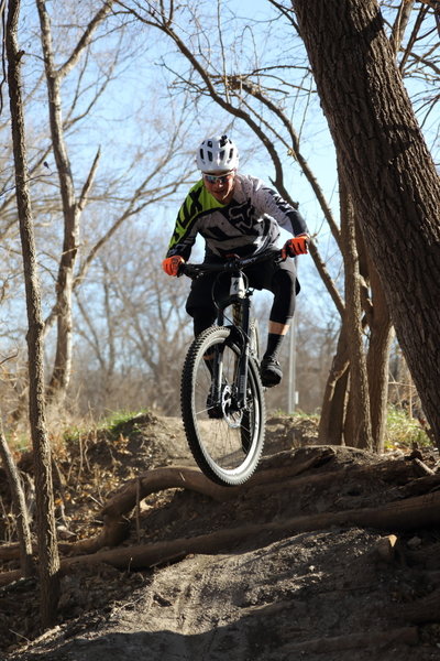 Adam sending into the drop->berm->rock garden portion of Sandy Flow