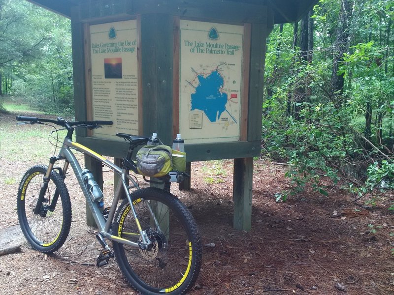 Transition between the Swamp Fox Passage and Lake Moultrie Passage, just inside the woods from the old / closed parking area on the east side of Hwy 52.