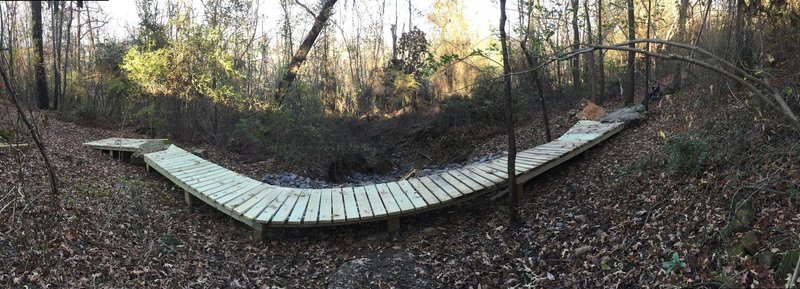 Wide angle of new bridge and jump on Barrel of Monkeys Loop.