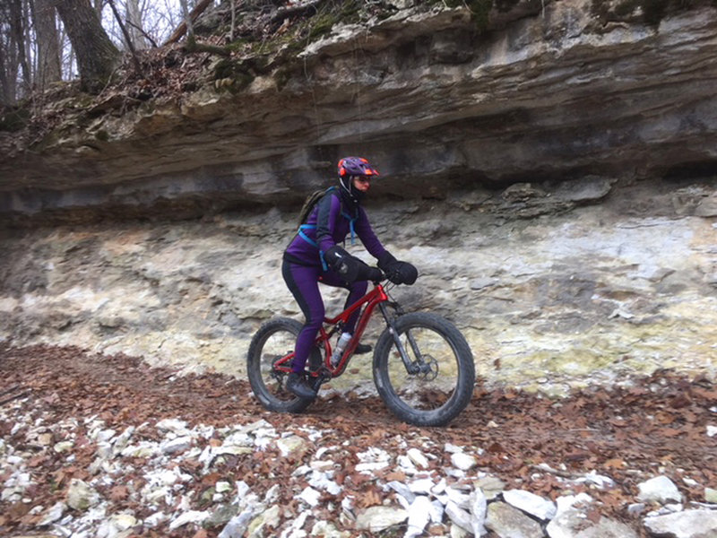 J. riding along characteristic Ozark geological formations.