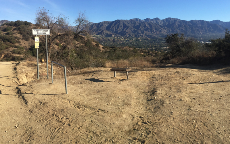 5 points - Looking at entrance to Canyon Trail on right of the bench