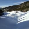 Tailings from Reiling Dredge viewed from the trail in the winter.