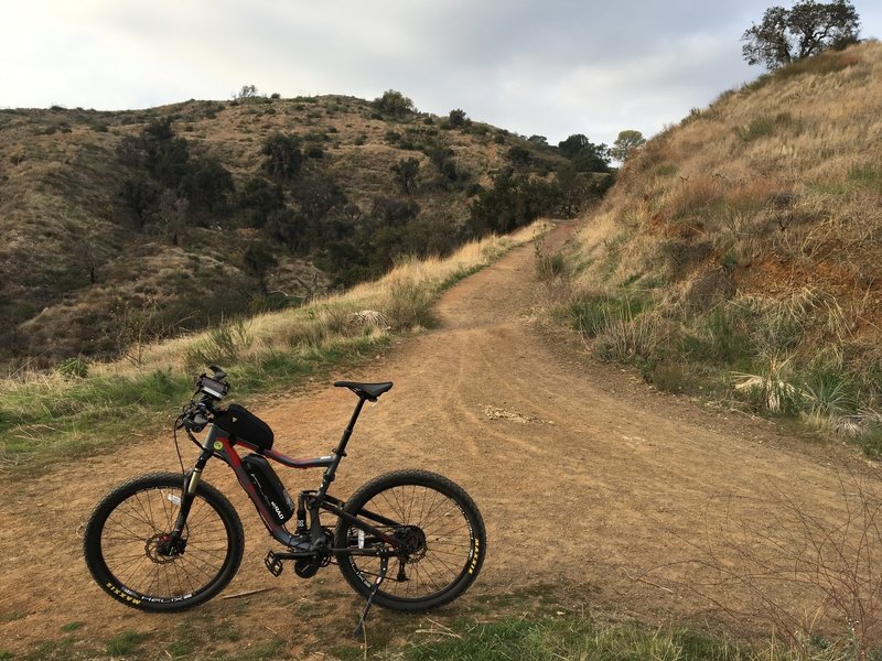 About 0.6 mi up the trail, behind is a great view into the SGV.