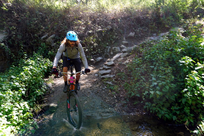 Patrick hits a switchback splashdown special near the top of El Prieto