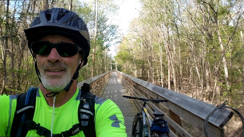 Looking west on the Wateree Passage near the suspension bridge. The wooden planking is complete on the last trestle... can ride all the way across the Wateree River bridge without getting off the trestles.