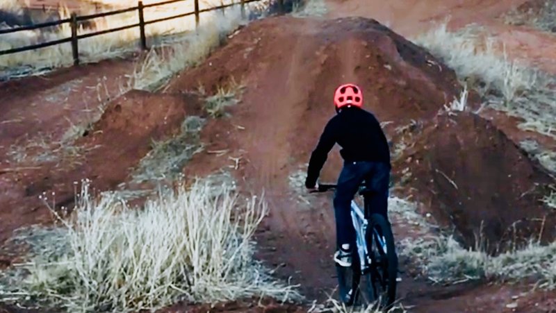 About to hit the first jump. First time ever bike jumping.