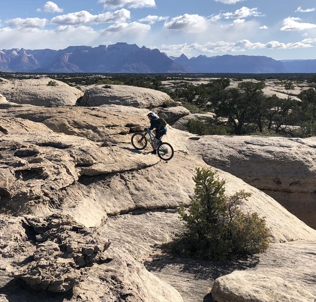 Cranking up a steep slickrock section