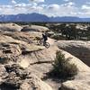 Cranking up a steep slickrock section