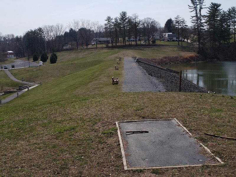 Benches on top of hill at the lake