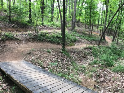 Dropping down into the gorge. Either direction it's a roller coaster ride down and a grind out.