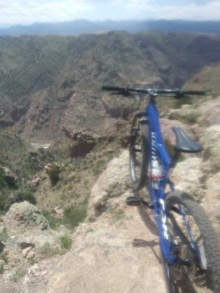 On the Canyon Rim Trail, one of the Royal Gorge trails, at a good place to stop and stretch.