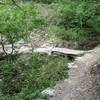 Wonky bridge adds to the unique flavor of The Ledges trail.