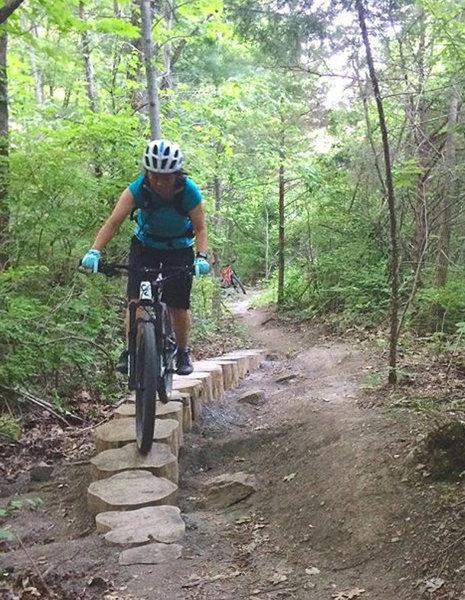 Rie rides stumpy alt line on Perimeter Trail