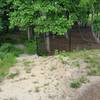 The entrance to Straight Nature Trail is to the left side of the Dog Park fence.