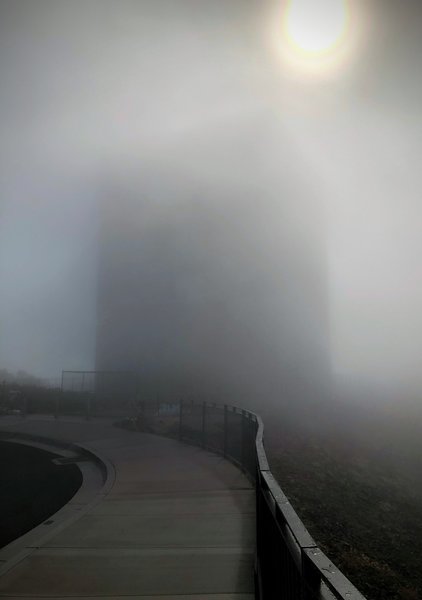 Mount Umunhum radar tower in a cloud.