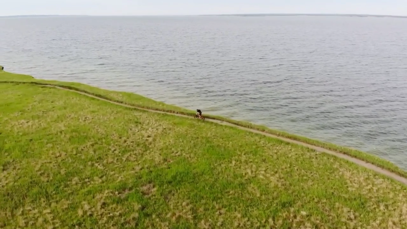 Riding east along the south shore enjoying the lakeside breeze.