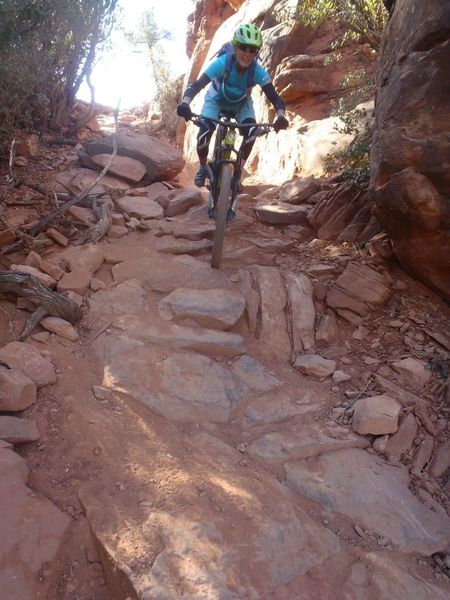 Liz shreds a rock chute