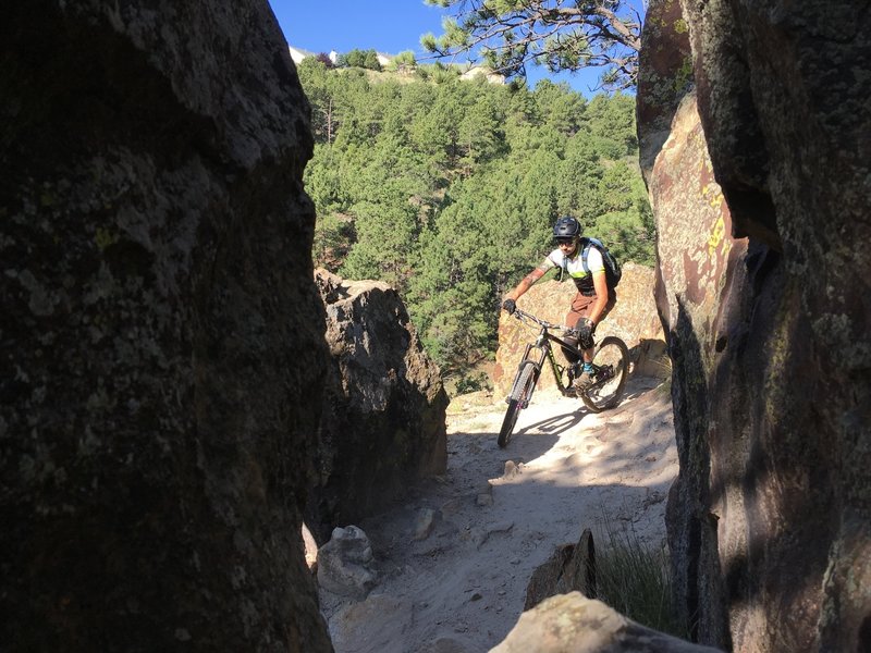 A-Ron threading the gap into an armored switchback.