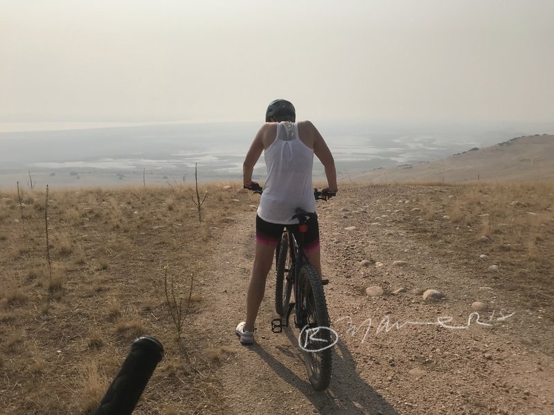 At the very top, great views...minus the smoke! This is my second time riding this trail. This last one with my wife, which I wanted her to experience an excellent trail with some beautiful views and wildlife. Unfortunately, the smoke didn’t help :(