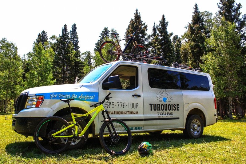 The Turquoise Tours shuttle at Garcia Park.  They run shuttles to the South Boundary Trail, with drop off locations at the park and the trailhead on Forest Road 76 south of Angel Fire.