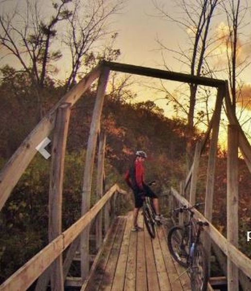 Got on the hiking trail by mistake, crossing the bridge to get over a creek