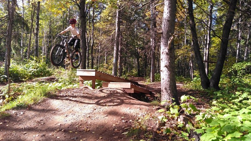 My son enjoying the progression of the drops in this neat section!