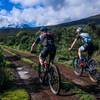 Pro team Thomas Turner and Gordon Wadsworth (right) climbing Kilimanjaro in the 2018 MTB Stage Race.  They would go on to win the duo division while setting every course record imaginable.