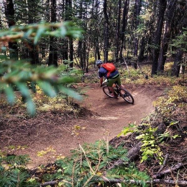 Flying through the berm on Upper Drain.