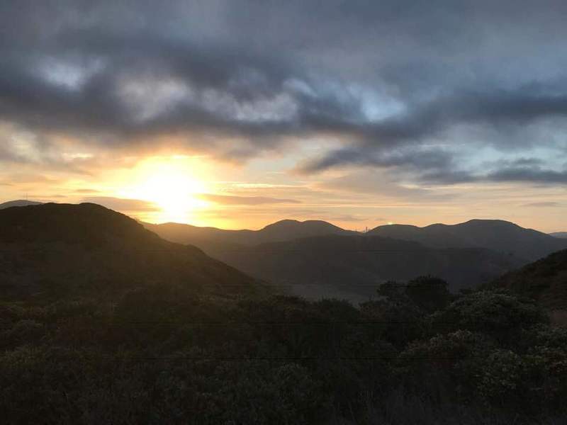 Going up Miwok and glancing at the sunrise (you can see the city on the right if you zoom in).