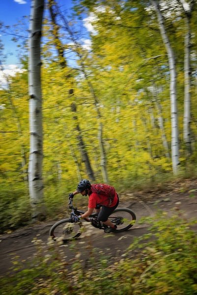 Descending a berm at Aspen Snowmass.