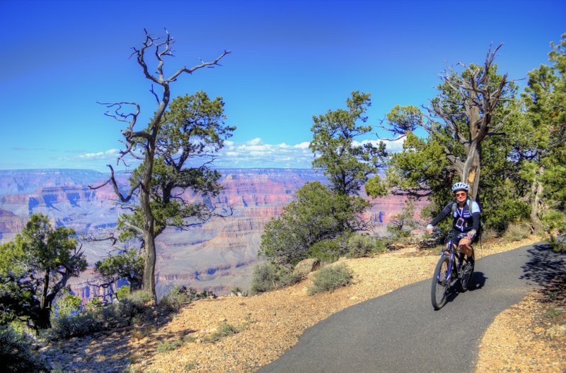 Riding next to the rim of the Grand Canyon.
