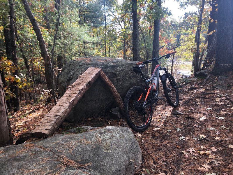 A technical double-rock roller with a skinny in between at the top of a hill with nice views of Rt. 3