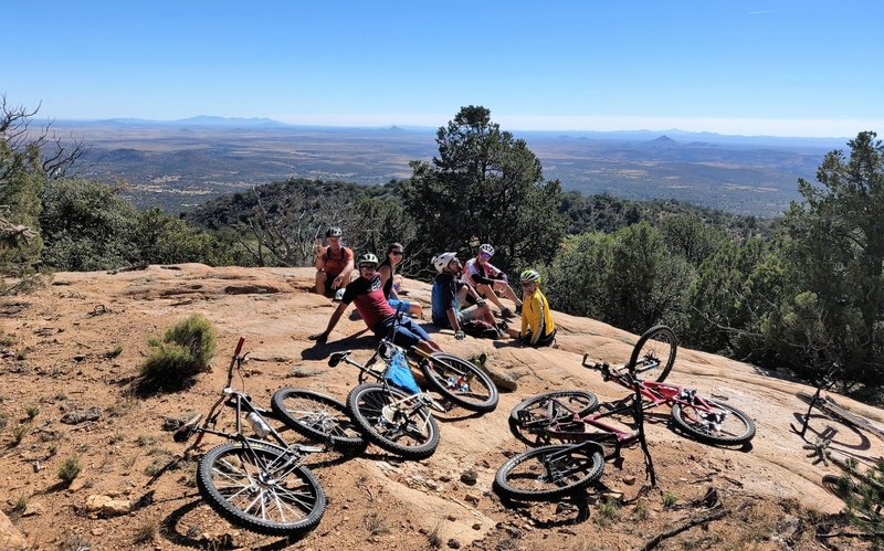 The group takes a well earned rest stop to appreciate the stunning views along the most significant climbing section of this route.